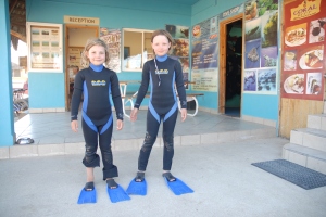 After watching me pull these things on for years for open water swims, the ladies finally get suits of their own...