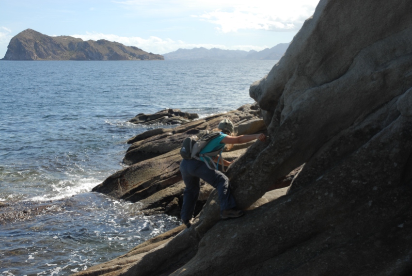 We overshot a little, and had to hustle to beat the tide back to camp. Sylvie seen here doing a little bouldering.